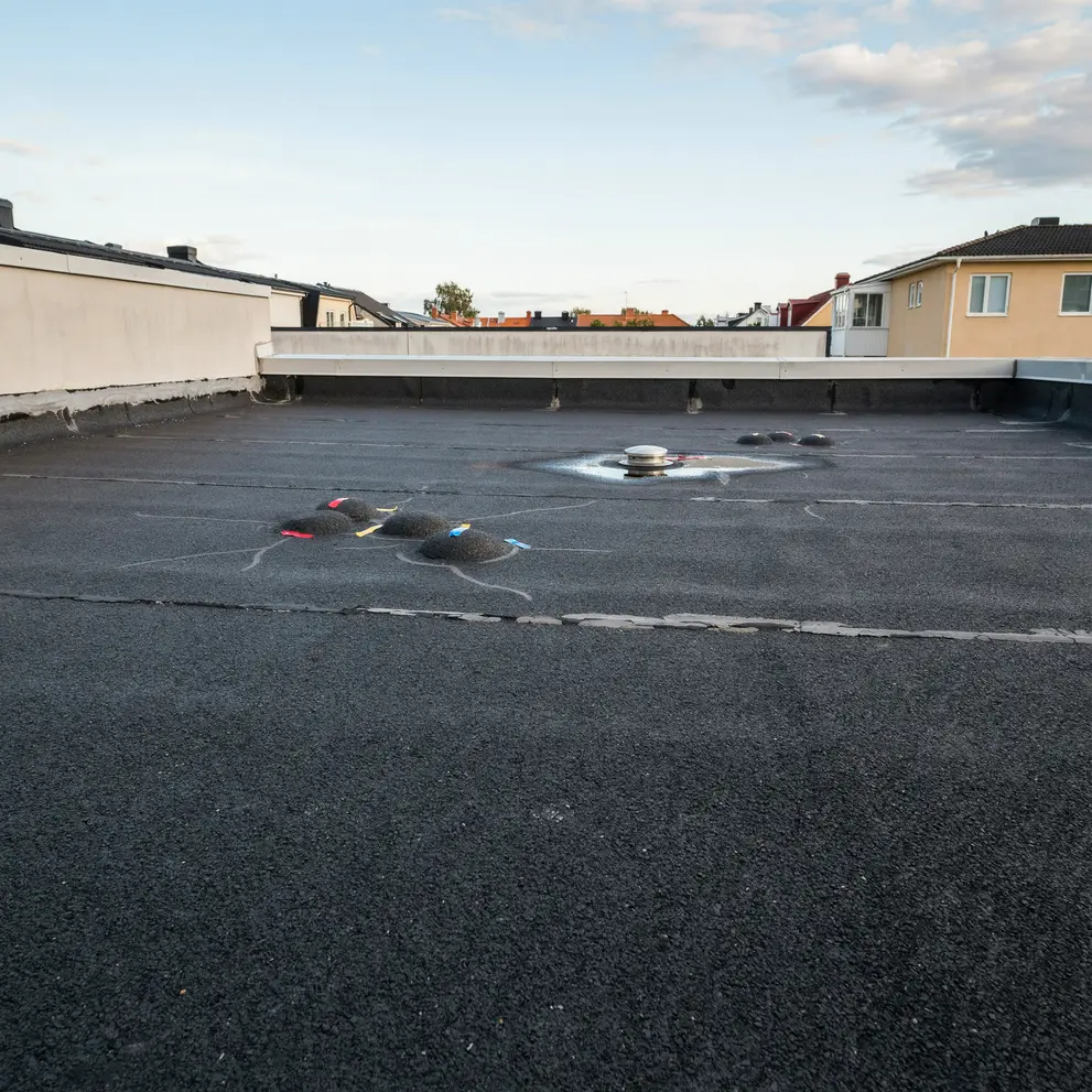 besiktning tatskikt innergard mark parkering gjutasfalt malmo skane